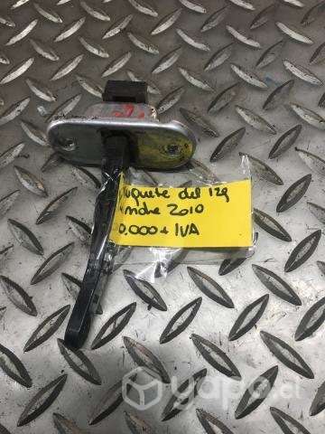 Trinquete puerta del izq Mahindra 2010