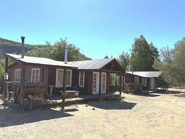 Parcela en venta con tres cabañas en San Fabián, Chillán