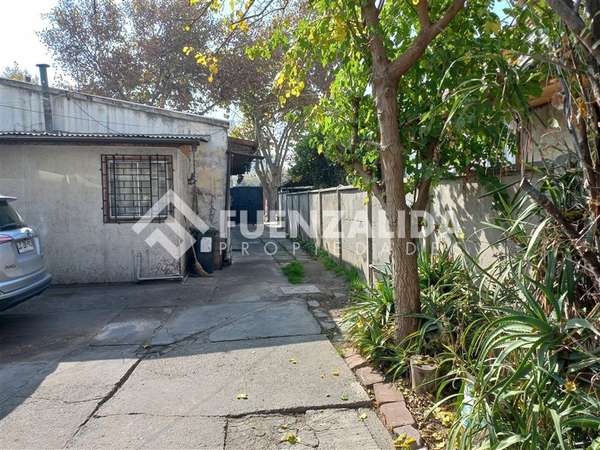 Oportunidad de Inversión en San Miguel Terreno con 2 Casas