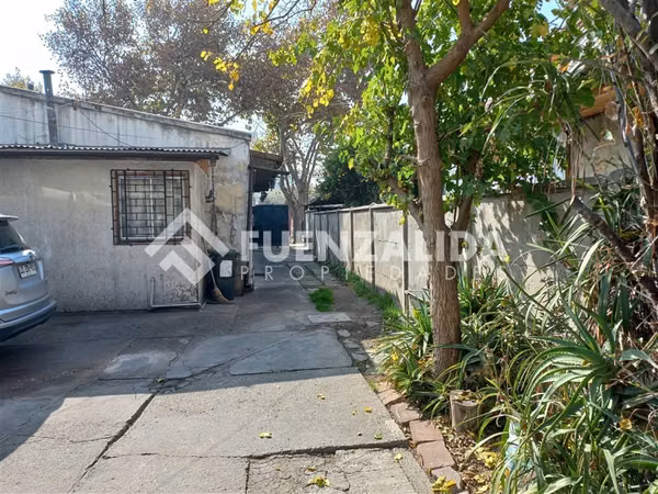 Oportunidad de Inversión en San Miguel Terreno con 2 Casas