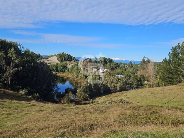 Parcela en Ilque: Naturaleza, Agua y Acceso Ideal