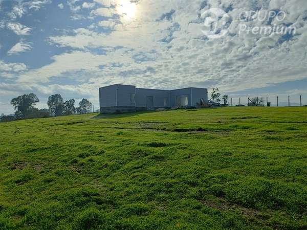 PARCELA CON 2 CASAS NUMPAY