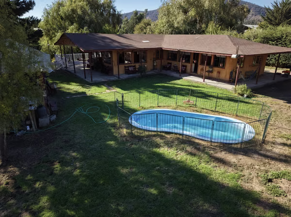 CASA MINI PARCELA SAN MANUEL CON FRENTE A RUTA G60