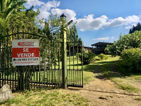 Parcela de 5.020 m² con 3 Casas Independientes, Mo