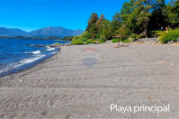 Remax vende paño inmobilario borde lago -pucon.