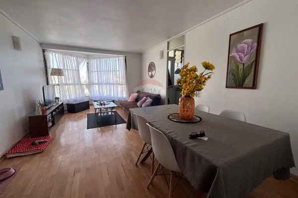 "hogar urbano en el corazón de santiago"
