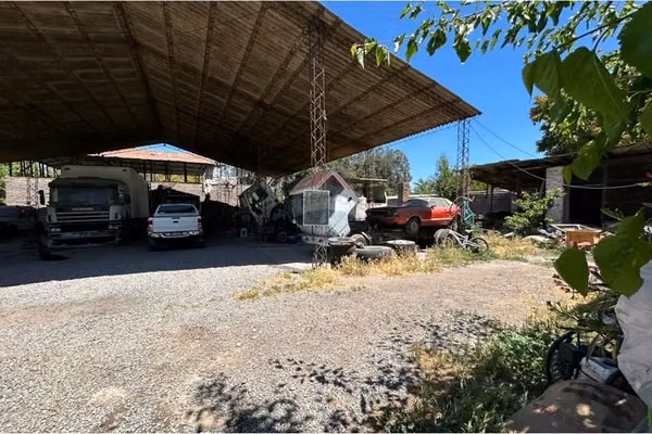 Arriendo de terreno con galpón en viluco.