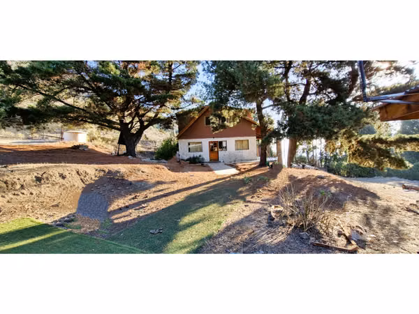 Venta de parcela de 15.000 m2., con casa, quincho y piscina, en Pucalán. 200 M$