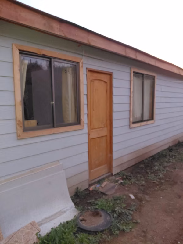 PARCELA CON CASA