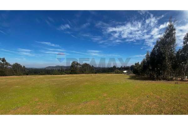 Venta parcela con casa amoblada