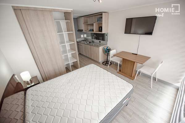 Arriendo departamento estudio a estrenar, semi amoblado - Estacionamiento - Metro Republica