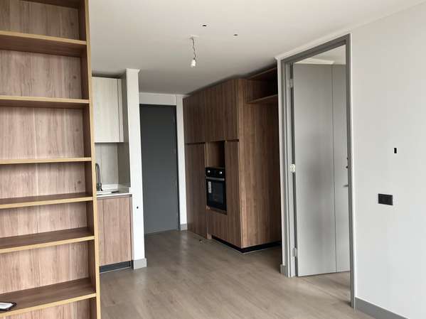 NUEVO UN DORMITORIO, ESTACIONAMIENTO Y BODEGA