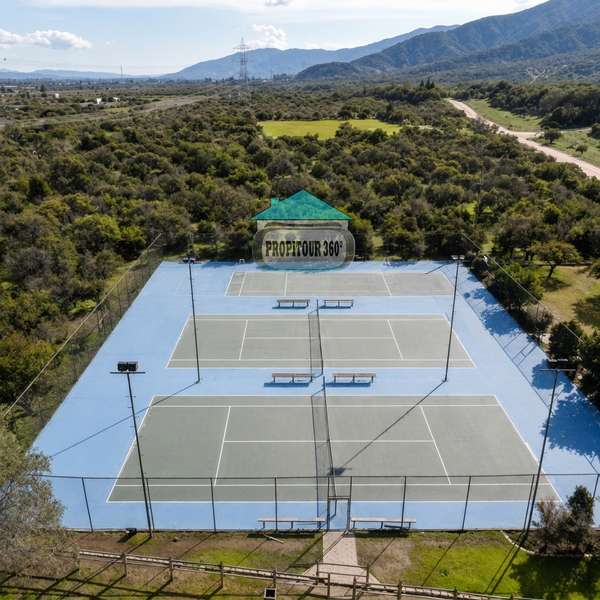 TERRENO EXCLUSIVO EN CONDOMINIO ALTOS DE OLMUÉ
