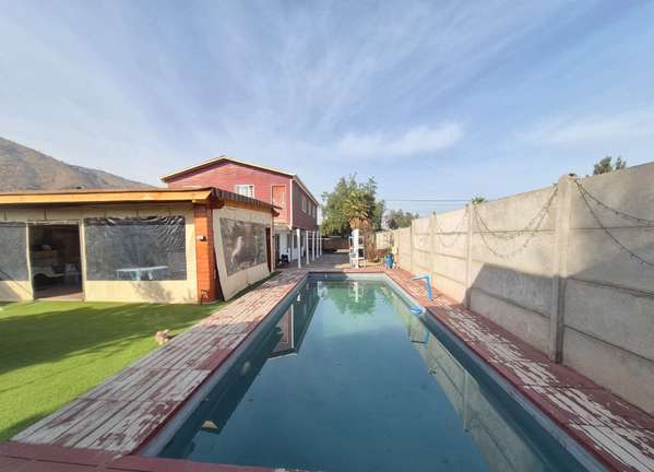 AMPLIO TERRENO CON DOS CASAS, PISCINA Y QUINCHO, ALTO JAHUEL