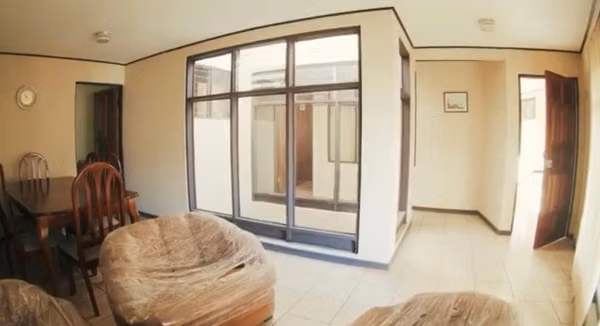 En venta edificio en Barrio Amón con 2 apartamentos y sala de reuniones