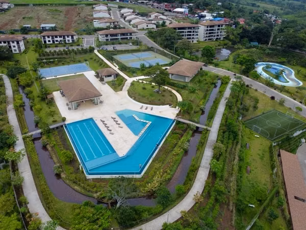 Near Zona Franca-Pristine Turnkey Condo — River, Trails & Resort Life-El Canal Grecia