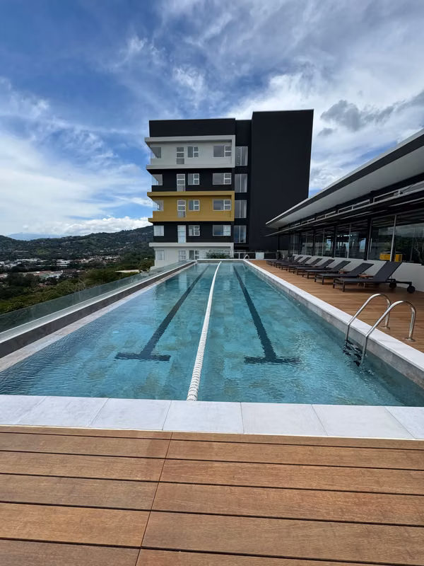 All FURNISHED Modern 1-Bedroom Apartment with Rooftop Pool and Panoramic Views in Santa Ana