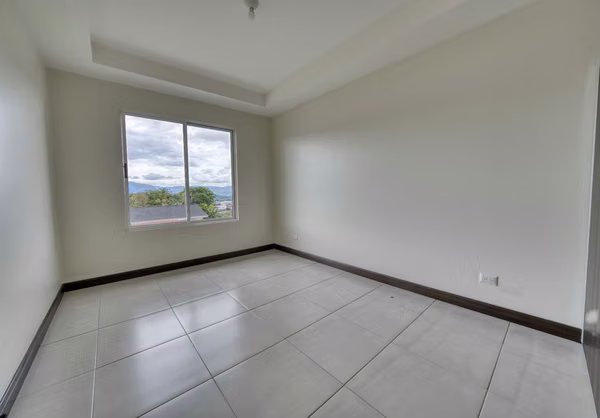 Se Alquila Casa Esquinera en Condominio Altos de Sabanilla, Montes de Oca 3 Habitaciones y Patio Privado NJA1448JB