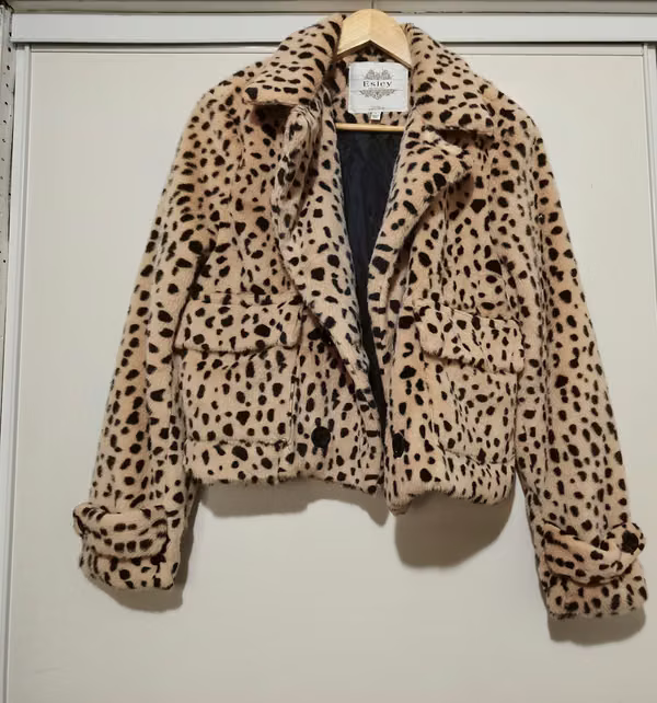 It's sold blazer, animal print. New