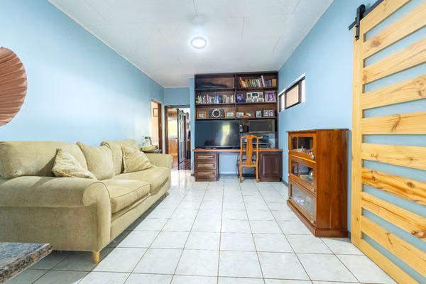 ¡Casa con 815 m² y uso de suelo mixto en el corazón de San Rafael de Heredia!