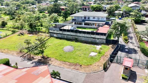 For Sale: 100% Flat 630 m² Lot in a Gated Community with Ample Green Spaces and 24/7 Security