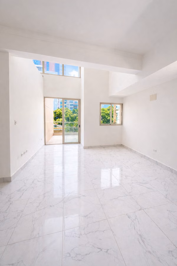 1-Bedroom Loft Apartment for Sale in Naco | Terrace & Double-Height Living Area