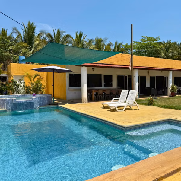 Monterrico | LARGE Yellow Beach House for Sale!