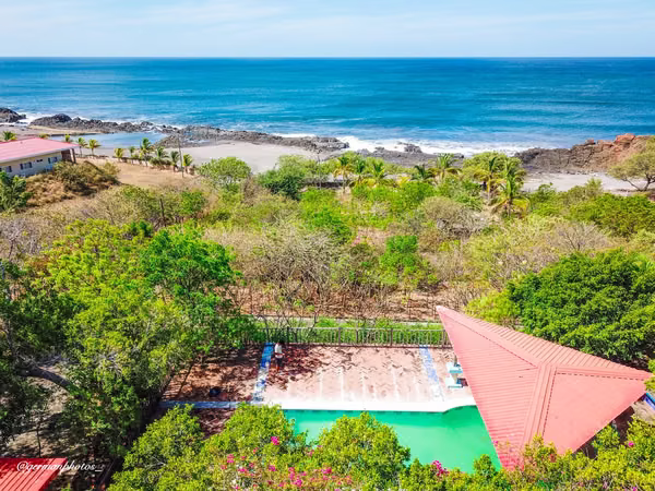 Spacious 4-bedroom beachfront hill property