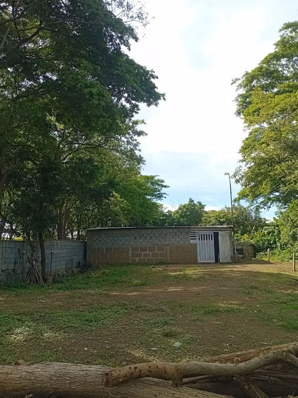 LOT OF LAND WITH BUILT HOUSE.