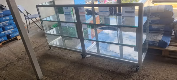 Aluminium and glass vitrines.