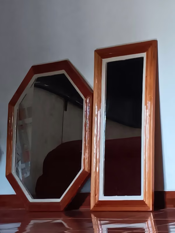 Mirrors of bitter cedar wood