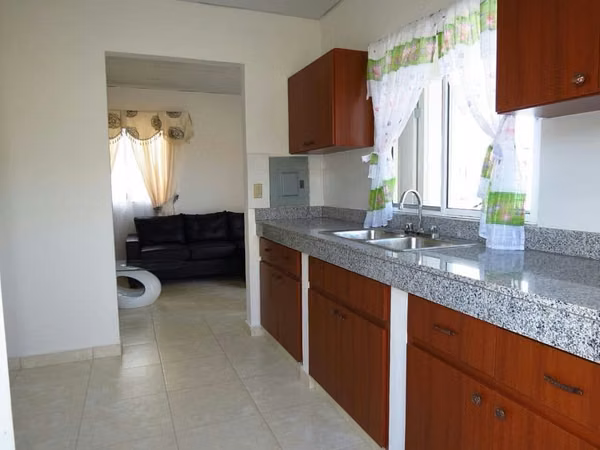 HOUSE IN PATRICIA ITALIA RESIDENTIAL, SANTIAGO 3BR 2BA $77,000
