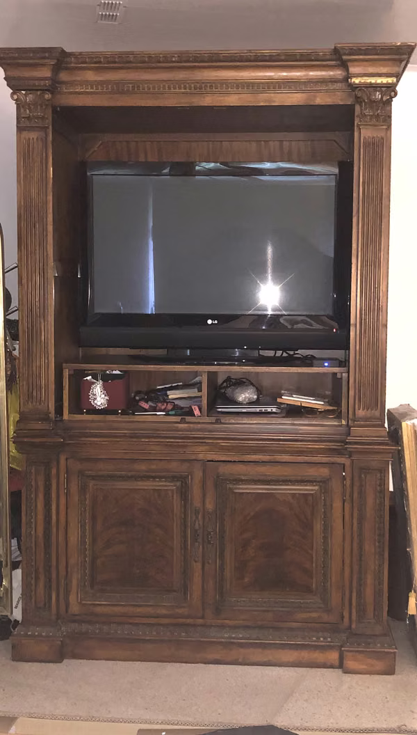 Mahogany furniture for TV. Two deep drawers at the bottom and a lot of space to save what you want