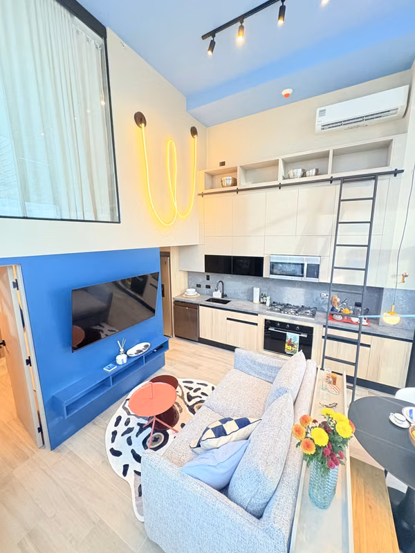 in Coco del Mar Double-Height LOFT Apartments