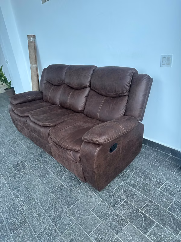 Selling reclinable sofa of 3 positions (as new)