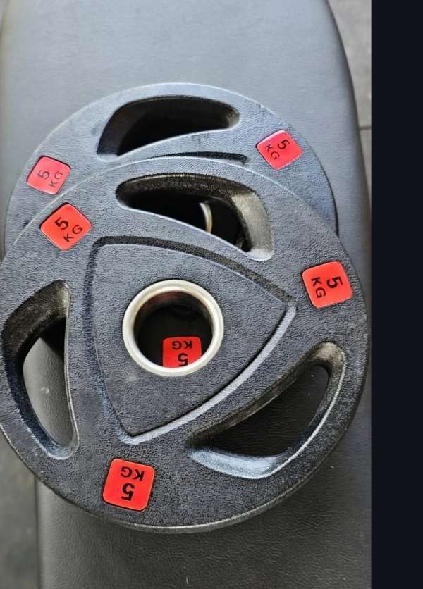 Discos Olímpicos Tri-Grip (2.5 kg, 5 kg y 20 kg) – Se vende todos o por pares