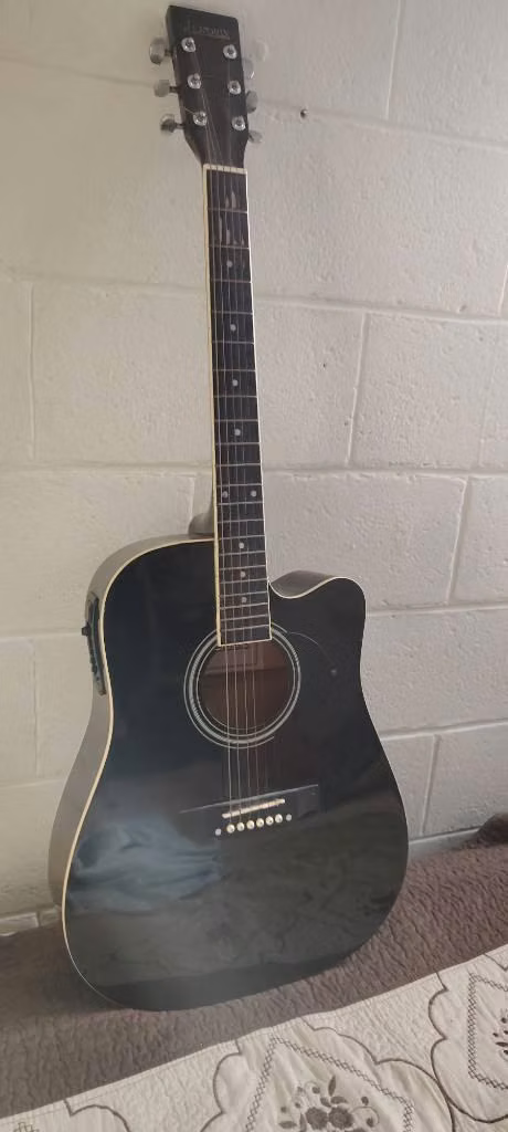 Guitarra electro scustica