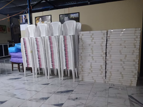 Chairs, tables and decorative tablecloths.