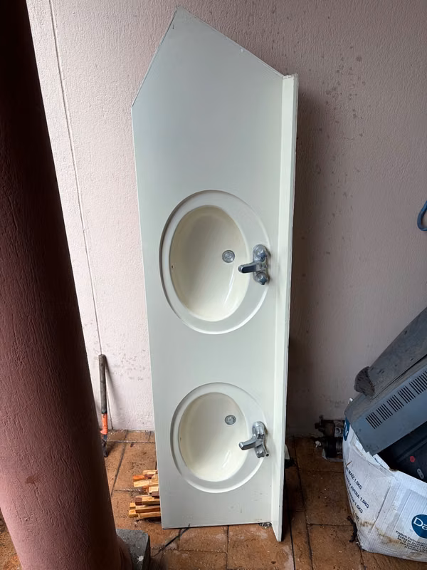 Cover with double integrated lavatories