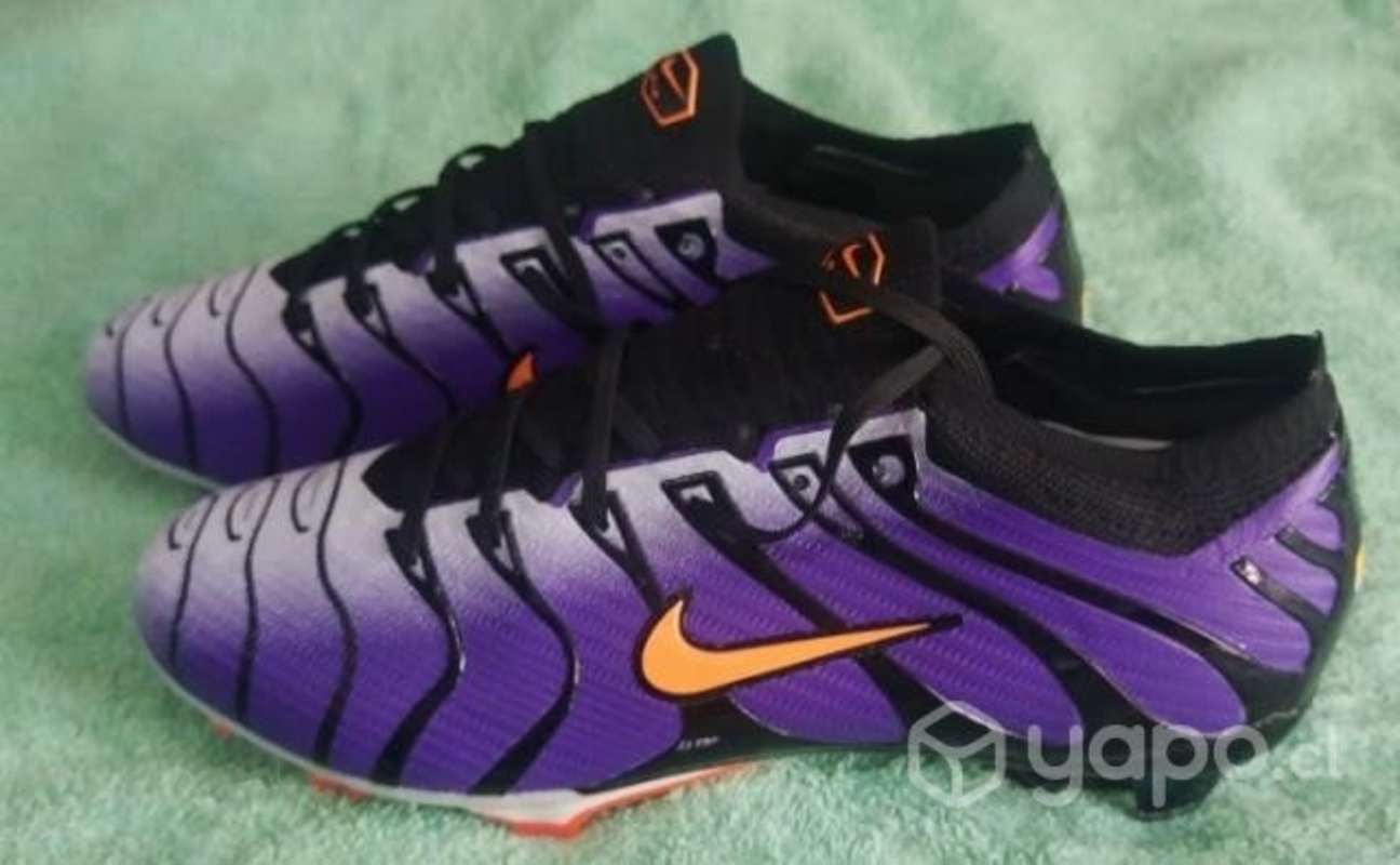 Chuteadores mercurial air zoom Lota