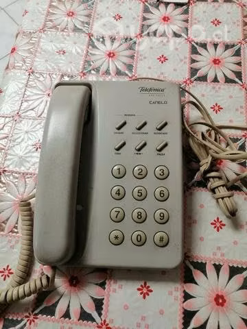 2 teléfonos antiguos, funcionando los 2