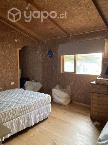 Se vende terreno con cabaña