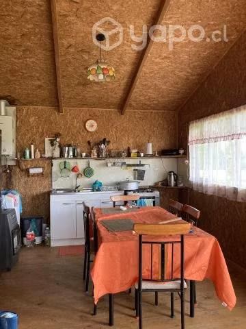 Se vende terreno con cabaña