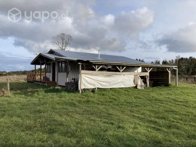 Se vende terreno con cabaña