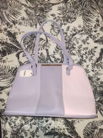 Cartera Sei nueva