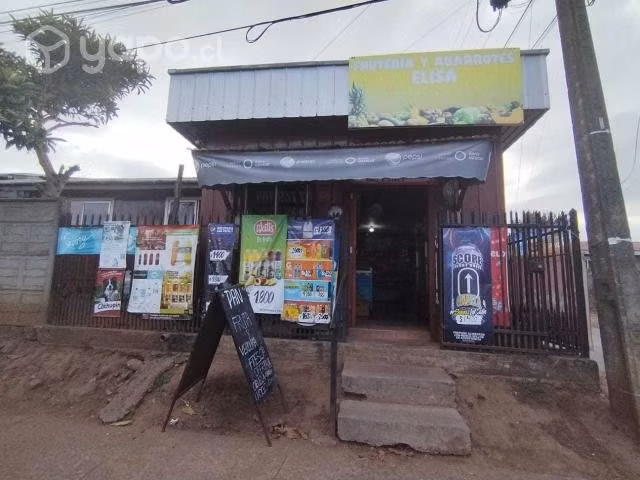 Casa con local comercial