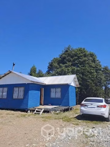 Sitio con cabaña