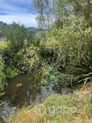 Terreno plano con agua en buchupureo