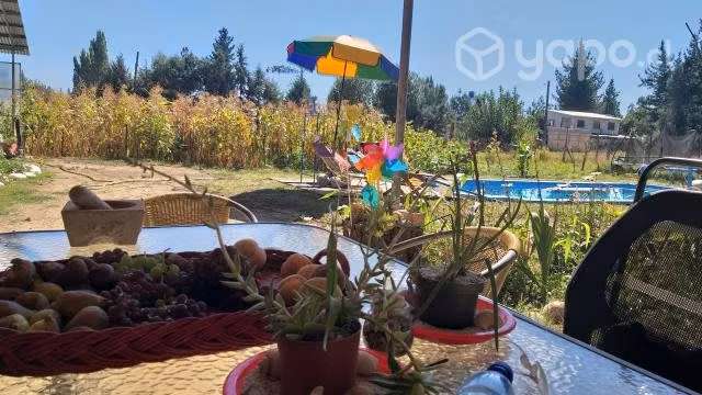 Parcela con casa y piscina