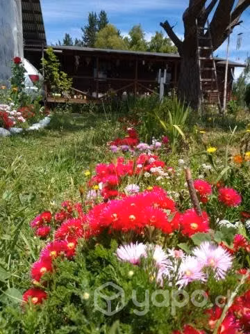 Parcela con casa y piscina